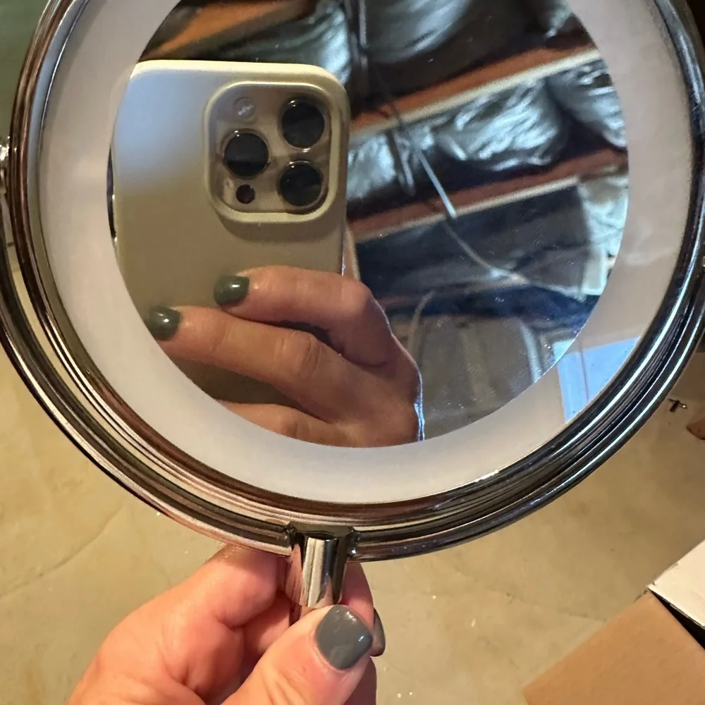 Conair double sided mirror w light.